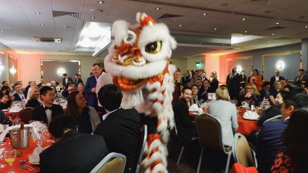 Traditional lion dance makes sure Chinese New Year business banquet is a roaring success