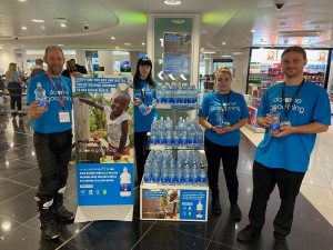 Flying visit to Bristol Airport by water charity founder to thank duty free store’s support