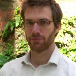 Tom MacMillan (leaves, tieless)
